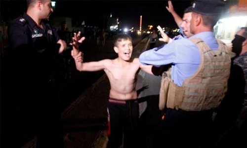 Televised Video Shows Iraqi Police Stripping Explosives From 15Yo ISIS Bomber